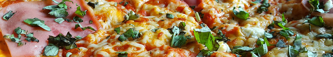 Eating Italian Pizza at Pizza Milano restaurant in St Clairsville, OH.